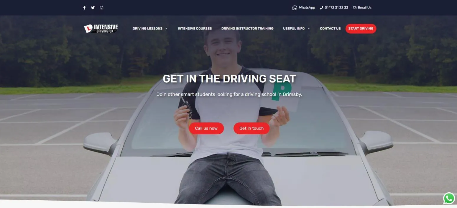 Homepage of Intensive Driving UK, a Grimsby driving school, with a new driver holding car keys and a P plate